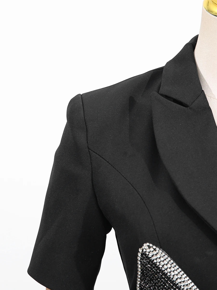 Seyna a bold, hollow-out black Blazer mini dress with sequin patchwork