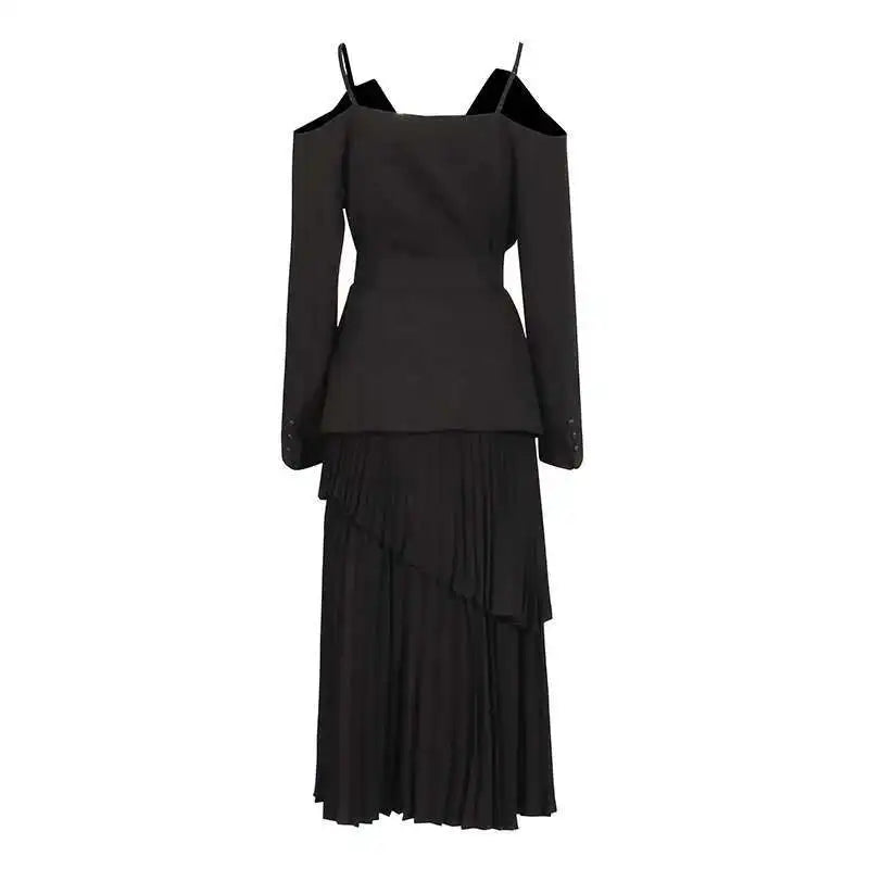 Elan two-piece set featuring a cold shoulder blazer with belt and pleated skirt
