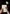 A close-up image for LU DI LUSSO's Contact Us page, showing a woman's hands writing with a fountain pen on elegant paper, conveying personal and attentive customer service.