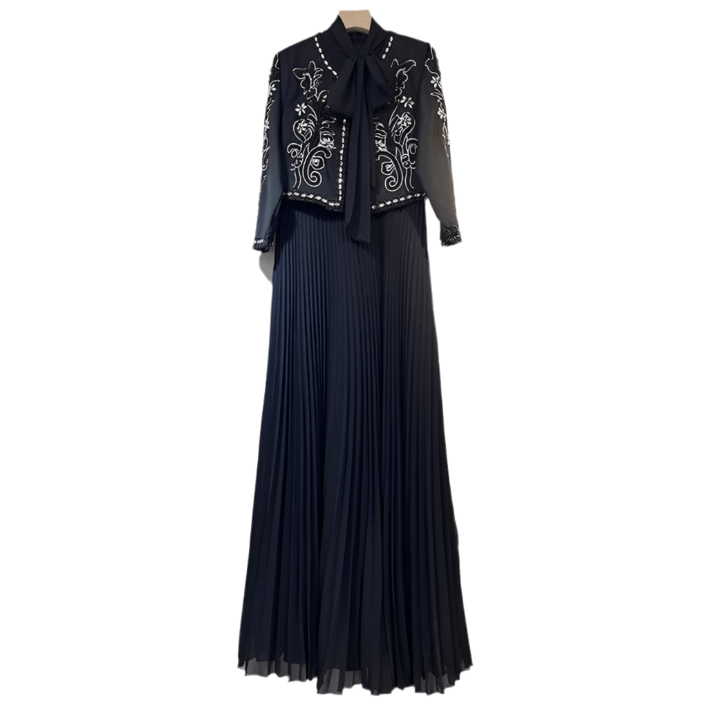 Naurelle featuring a detailed embellished jacket and a pleated maxi dress - Lu Di Lusso